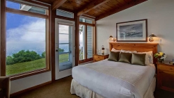 Image of This is a two bedroom suite, each with a queen size bed and a private bath. The suite also includes a comfortable seating area and kitchenette.